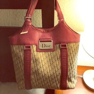 Christian Dior red bucket purse.